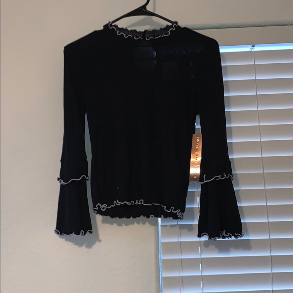 black and white ruffled blouse (size s)